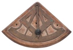 A brass Inclinometer: with square and compass frame and calibrated arc, mounted on a wooden base,