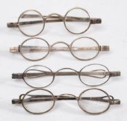 Four pairs of 19th century silver spectacles: London 1822, London 1835,