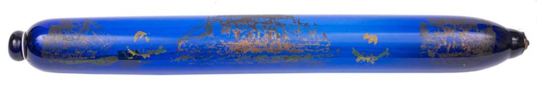A late Victorian large blue glass rolling pin enamelled with 'The Great Eastern Steam-ship' to