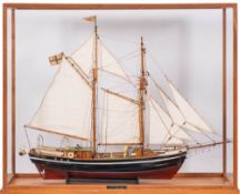 A cased scale model of the Swedish Top Sail Schooner 'Lilla Dan': fully rigged over detailed deck