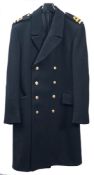 A Royal Navy regulation jacket for the rank of Lieutenant: together with a Royal Navy wool overcoat
