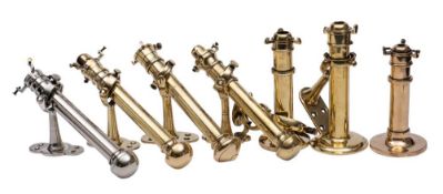 A group of seven various brass and silver plated cabin lanterns: comprising six gimballed lanterns