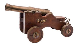 A Victorian bronze signal cannon: the 11 3/4 inch four stage ringed barrel with rounded trunions