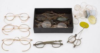 Three pairs of gold plated spectacles: together with a pair of steel spectacles with extending arms