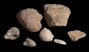 A collection of granite specimens: comprising two large examples and several smaller.