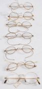 A pair of 9ct gold spectacles: together with six pairs of gold plated spectacles.