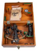 A Japanese 8 inch radius vernier sextant by Tamaya & Co Ltd: the black lacquer frame with brass arc