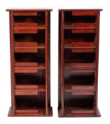 A pair of mahogany graduated cabin bookcases: each of five shelves, 103cm high.