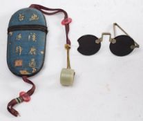 A pair of 19th century Chinese sunglasses in embroidered case:,