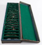 A box of eighteen various early 20th century spectacle frames: including a pair of tortoiseshell