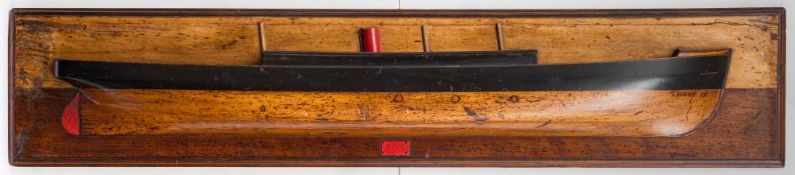 A half block model of the steam yacht 'Tammy III' : red painted funnel and mast stumps over cabin