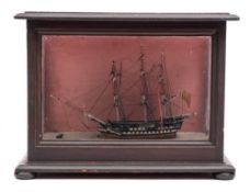 A late 19th/early 20th century cased waterline model of a frigate: standing and running rigged over