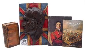 A carved wooden bust of the Duke of Wellington: in the manner of the ship's badge HMS Iron Duke,