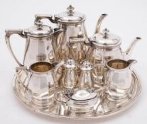 A Furness Bermuda Lines nine piece silver plated tea set and cruet by Mappin & Webb, London:,