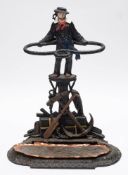 A cast iron maritime theme umbrella stand:,
