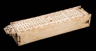 A 19th century Prisoner of War bone dominoes and cribbage set:,