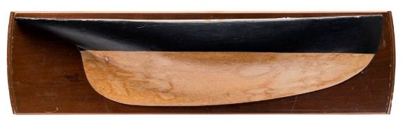 A late 19th /early 20th century half block model of a yacht: the hull painted black to waterline