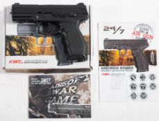 A Crossman 338 auto CO2 BB air pistol of metal construction with black plastic grips.