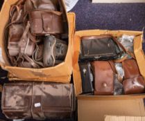 A quantity of various vintage cameras and photographic equipment.