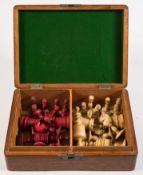 A 19th century bone English Barley corn pattern chess set: red stained opposition,
