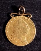 A 1792 mounted spade guinea.