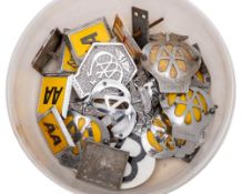 A collection of various AA car badges including a Trinidad example:.