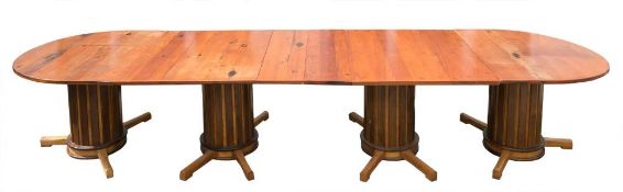 A large teak dining table constructed from the deck timber of HMY Britannia:,