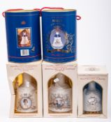 A group of five Royal commemorative Bells Whiskey bottles: