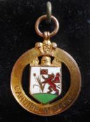 A 9ct gold and enamel medal for Cardiff M.C & C.