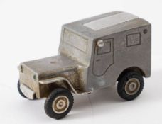 A mid 20th century West German alloy table lighter in the form of a WWII Willys Jeep by Baier: