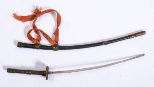 An early 20th century Japanese miniature katana letter opener: the plated blade over gilt brass