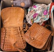 A large quantity of assorted handbags,: together with assorted purses and wallets (a lot).