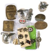A collection of various German military badges including: NSDAP lapel badge and others (some