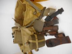 Two 1937 web equipment small packs: with various web frogs including web linesman plier carrier and