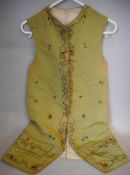 The following twelve lots are waistcoats and dresses from the Cumberland and Manx families of