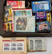 A collection of assorted diecast vehicles: jigsaws, puppets and other collectables.