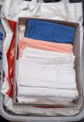 A quantity of various textiles: including table cloths napkins, etc.