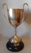 A George V silver twin handled trophy cup: maker Barnett Henry Abrahams, Birmingham,