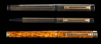 A Sheaffer Targa fountain pen in 'Tortoiseshell' finish with 14k nib: together with a Sheaffer