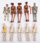 A group of Vintage Star Wars droid figures: comprising three 'EV-9D9', one 'IG-88',