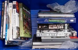 A collection of various Star Wars related books including: 'Star Wars toys.