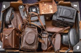 A quantity of various vintage cameras including: a large format junior special,