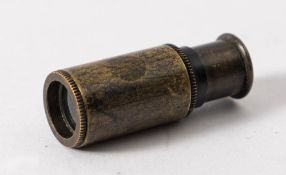 A WWII RAF/ SOE miniature brass telescope: single draw, 3.3cm closed, 4.5cm extended.