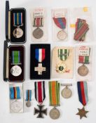A group of WWII and later medals: including a George VI Imperial Service Medal to Ernest Edward
