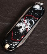 A collector's case of eighty special edition Victorinox Classic Swiss Army penknives: including