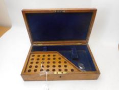 An oak pistol case for large calibre revolver: fitted for ammunition, with key, 30cm wide.