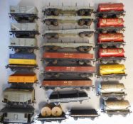 Hornby Dublo, a collection of assorted rolling stock: includes petrol tankers, closed vans,