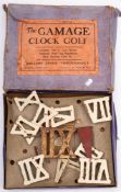'The Gamage Clock Golf Game' in original box: together with four iron and one brass headed putters