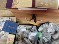 A box of coins including some sets: together with some cigarette cards, an autograph album, etc.