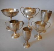 Six assorted silver trophy cups, various makers and dates: all awarded to H.M.Hicks, includes The B.